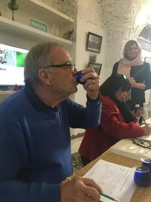 Guests enjoying a guided Tunisian olive oil tasting at Neapolyssa.